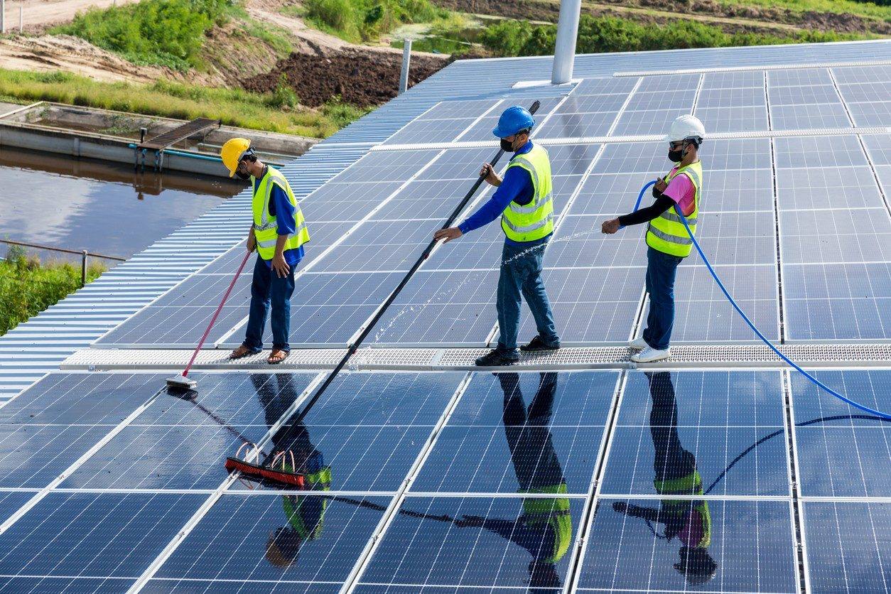 Crew cleaning a solar array